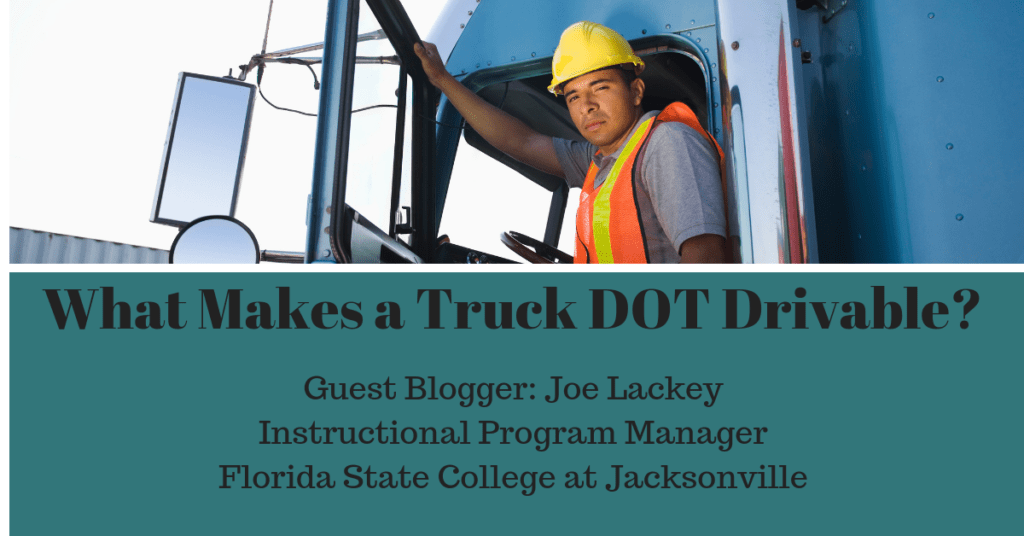 Truck driver sitting in front seat.